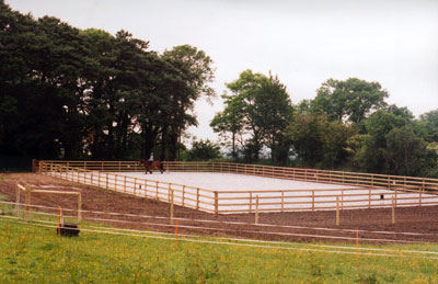 20×40m arena constructed in extremely wet conditions with no outfall facilities and finished using large soakaways with no open discharge