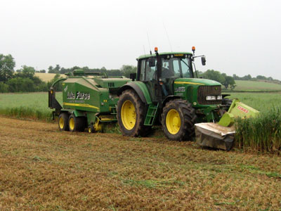 Harvesting Wholecrop Organic Winter Oats – Direct cut operation using a 10ft cut Mower Conditioner with John Deere 678 Baler Wrapper Combination