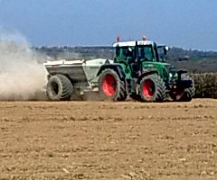 Lime being applied at the rate of 2 tonnes per acre – this field was later planted with Spring Barley