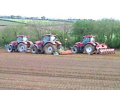 Planting Maize - 2 Power Harrows being followed with the Maize Drill